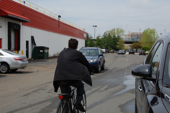 The most direct route to the T goes through a busy parking lot with no sidewalks.