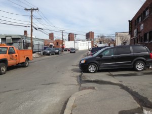 Sidewalks on New Street make the location too pedestrian unfriendly for the project to be considered "transit-centered."
