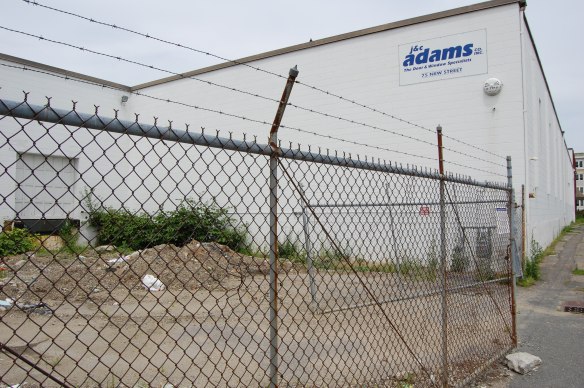 Pile of uncovered dirt at 75 New St. Gate was unlocked.