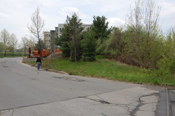 City-owned land at the end of New Street by the mall.